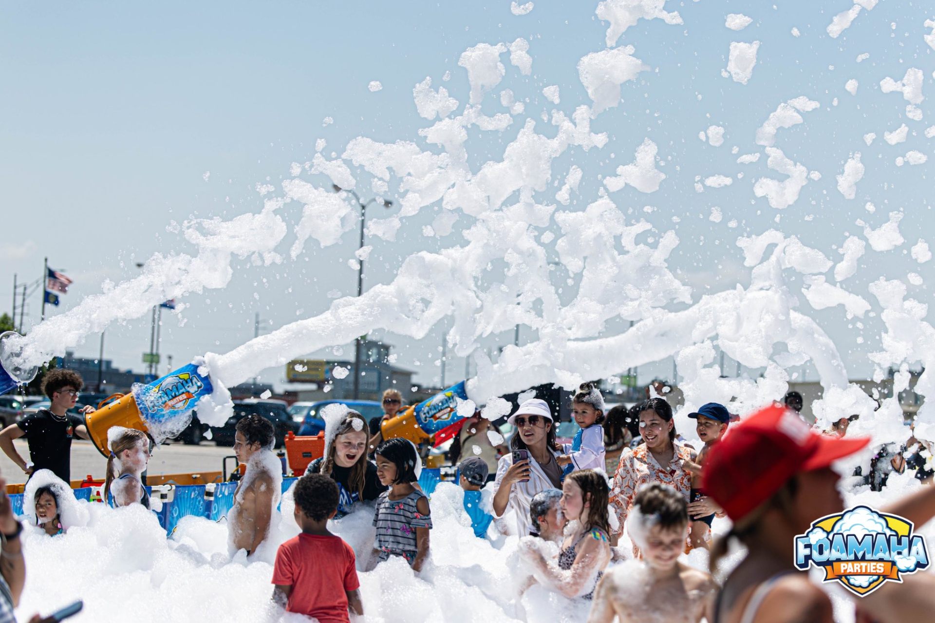 Foamaha cannons blasting foam over an excited crowd
